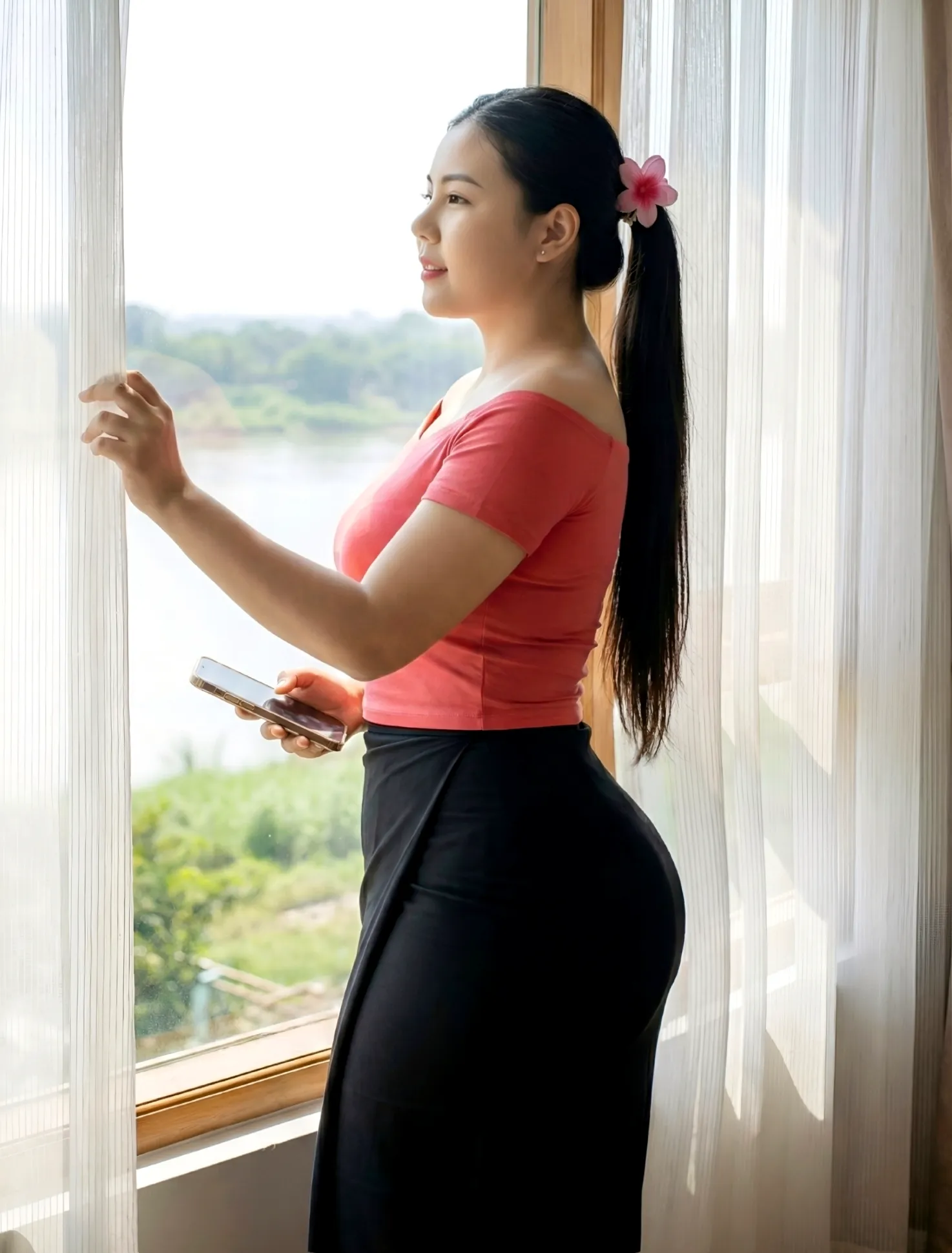 Modest standing Look Away + Soft Smile
pose in Myanmar longyi, natural daylight, elegant posture, family-friendly.