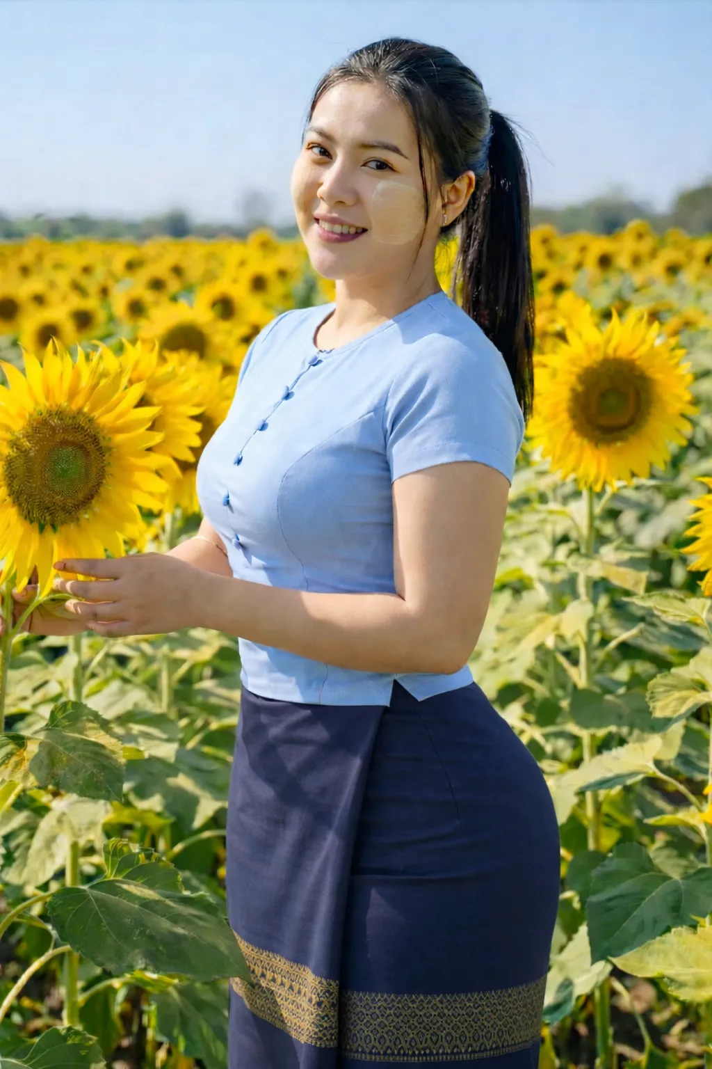 Modest Myanmar traditional outfit, Sky Blue top with Navy htamein, natural daylight, modest pose.