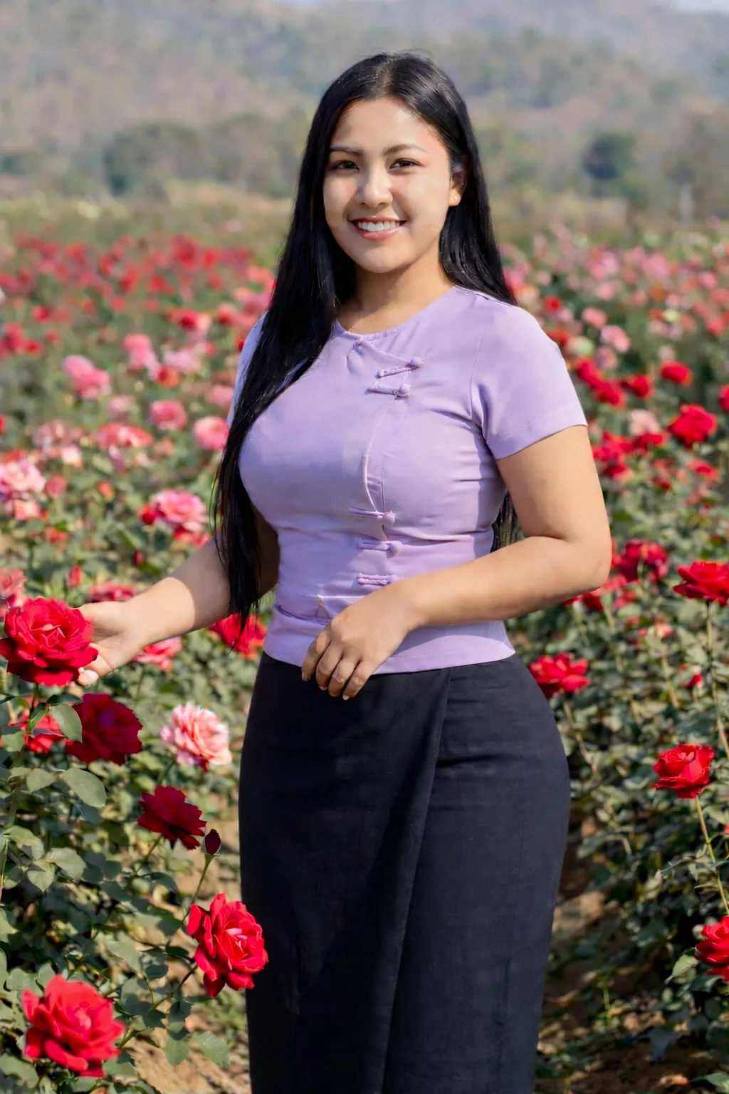 Modest Myanmar traditional outfit, Lavender top with Dark Neutral longyi, natural daylight, standing pose.